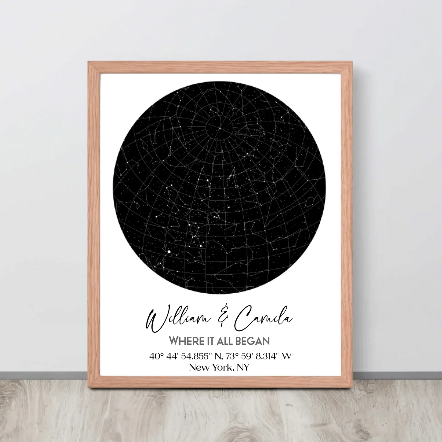 Red oak 11x14 inch framed custom star map featuring a black circular night sky with constellations, personalized with the names 'William & Camila,' coordinates, and the message 'Where It All Began'