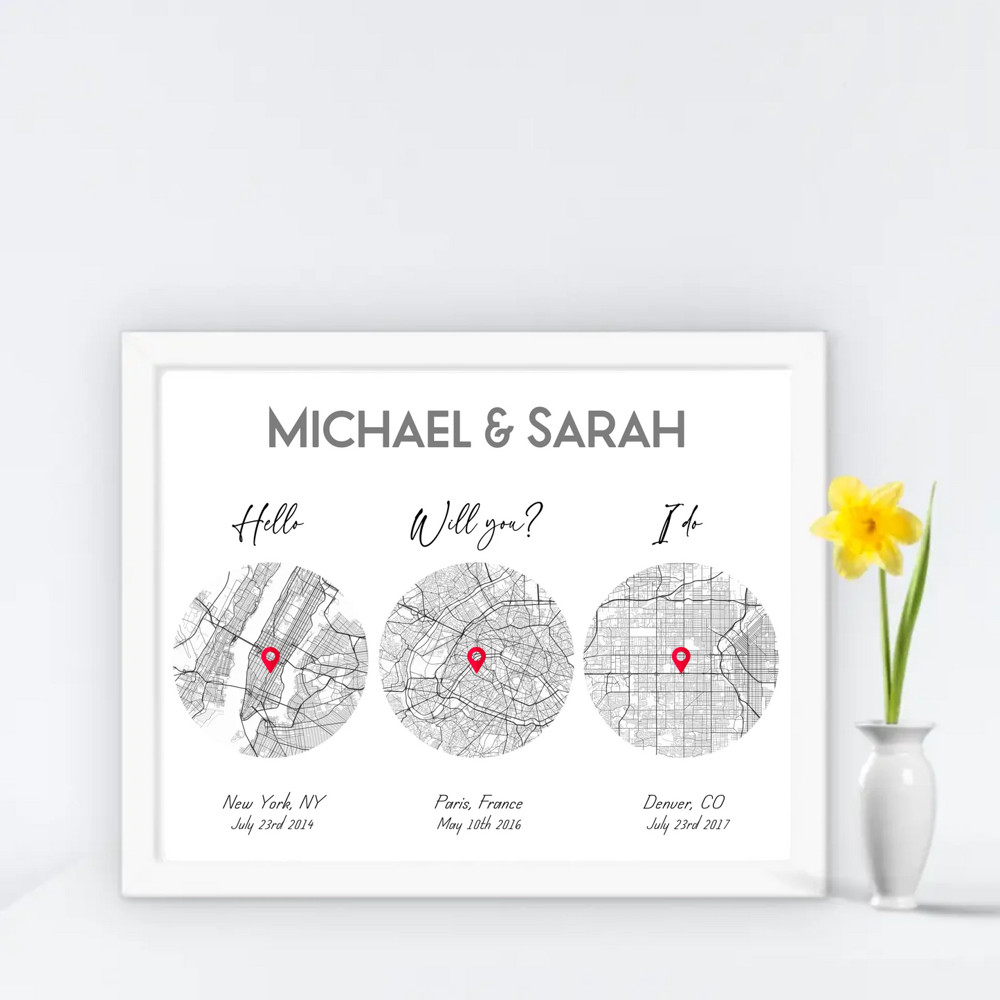 20x16 inch print with a white frame, showing a city map with three different locations of Hello Will you I do, personalized with the names 'Michael & Sarah’, places, and coordinates.