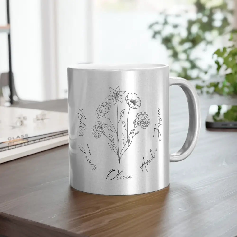 The right-side view of a silver mug placed on the table featuring a minimalist birth flower design surrounded by names is perfect as a personalized Mother's Day gift.