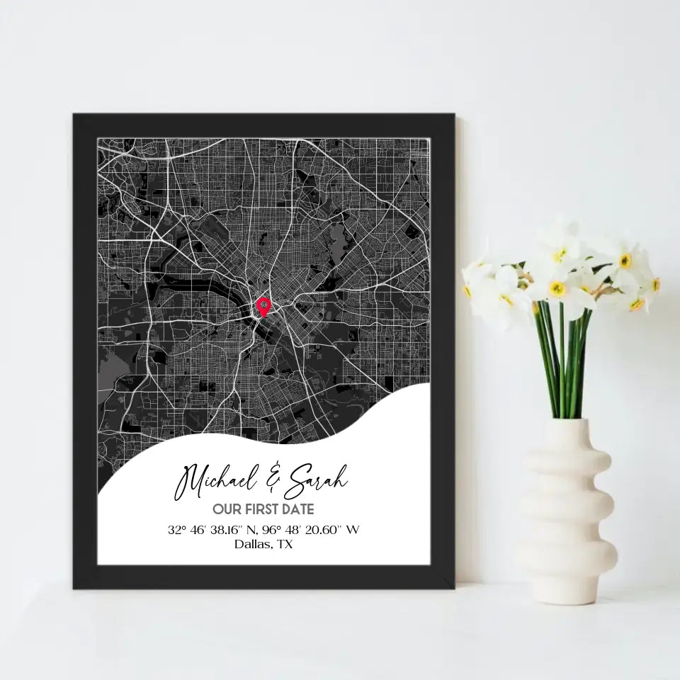 11x14 inch framed Our First Date map print with a black frame, showing a city map with a red pin marking a location, personalized with the names 'Michael & Sarah' and coordinates for Dallas, TX.