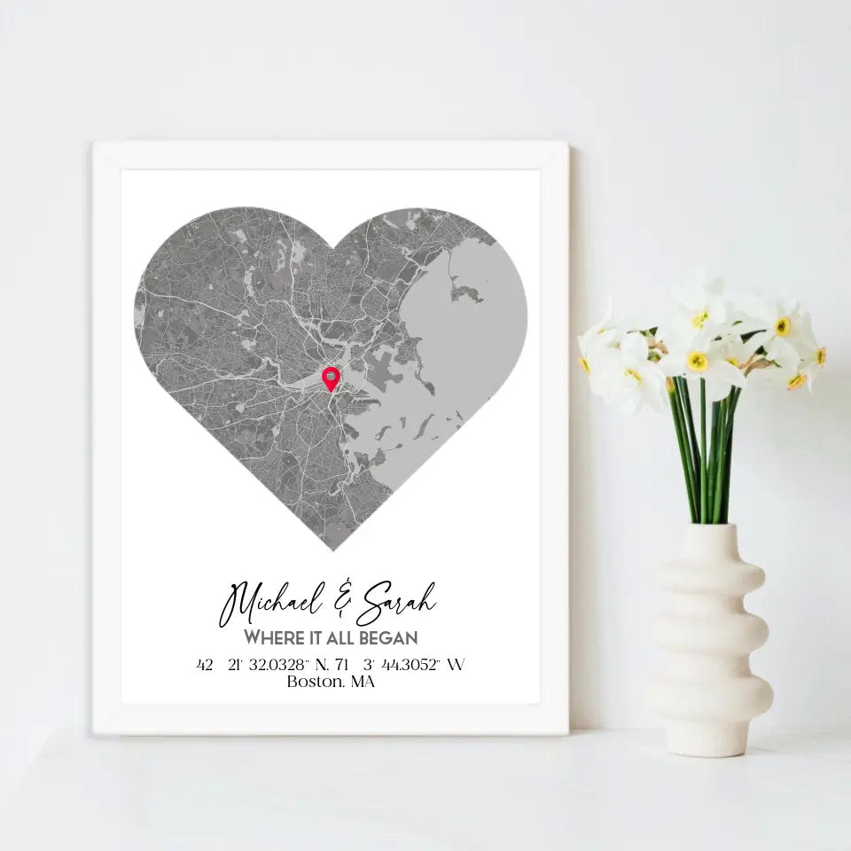 Where We Met Map Gift with an 11x14 inch white frame, showing a city map with a red pin marking a location, personalized with the names 'Michael & Sarah' and coordinates for Boston, MA.