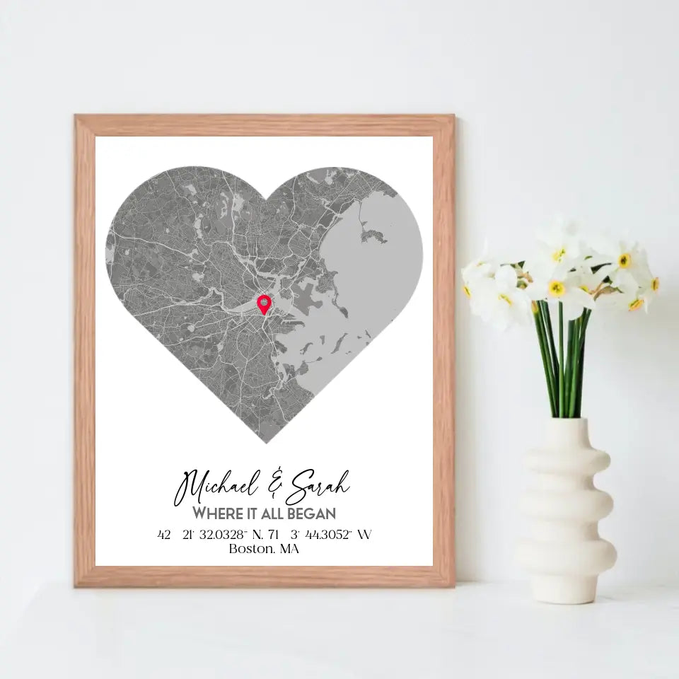 Where We Met Map Gift with an 11x14 inch red oak frame, showing a city map with a red pin marking a location, personalized with the names 'Michael & Sarah' and coordinates for Boston, MA.