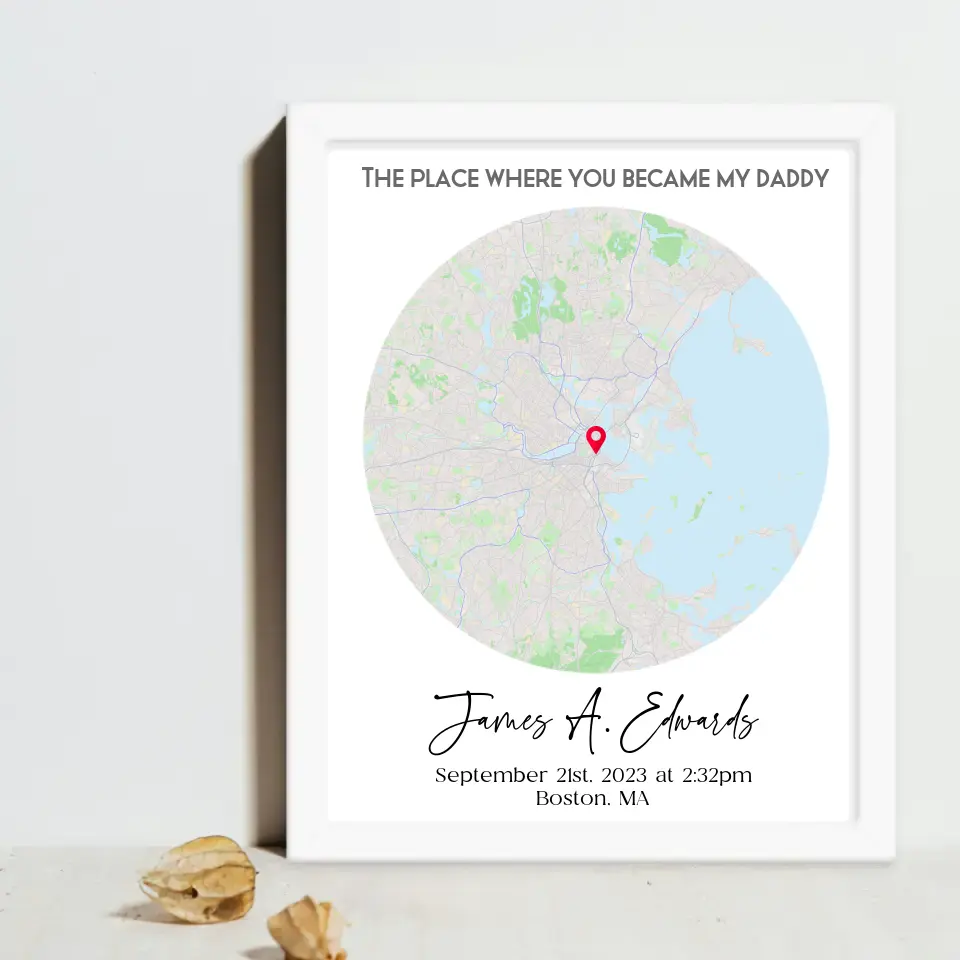 White 16x20 framed print featuring a city map with a red location marker and the text 'The place where you became my daddy,' personalized with a name, date, time, and location.