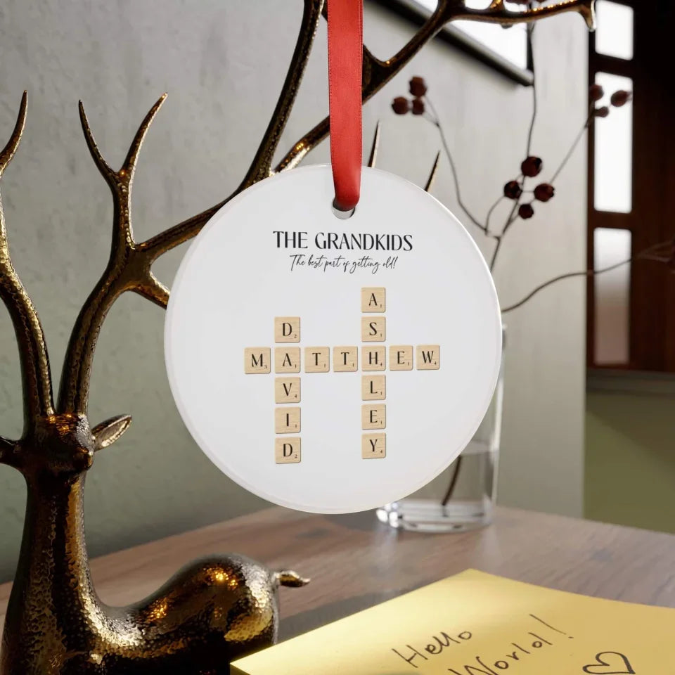 Personalized Christmas ornaments for grandparents hanging on deers antlers