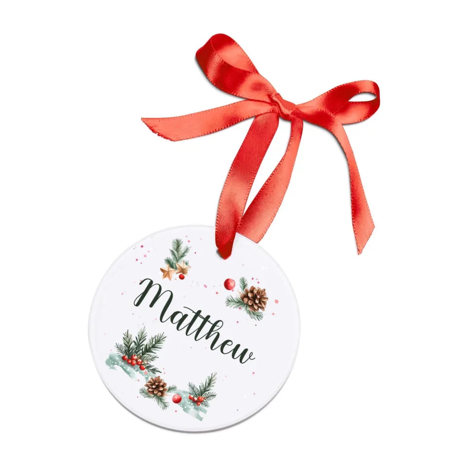 White acrylic personalized Christmas ornaments with name. Red ribbon included.